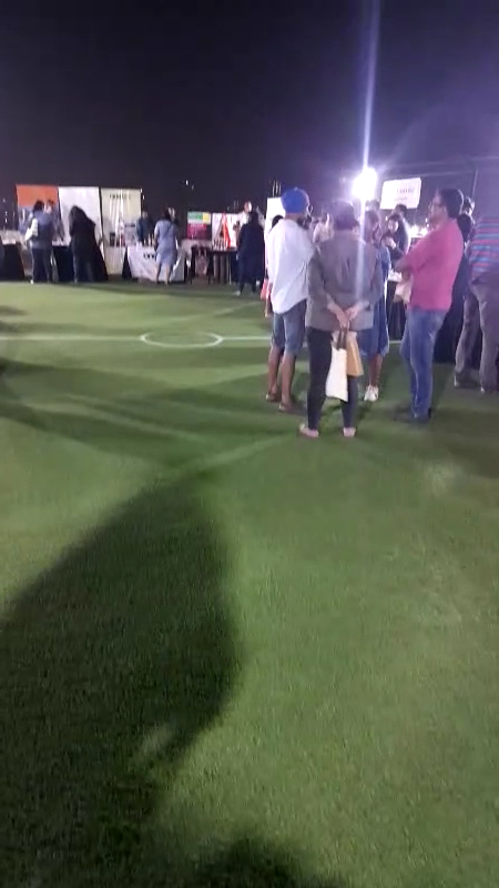 Open-air rooftop turf with a community event